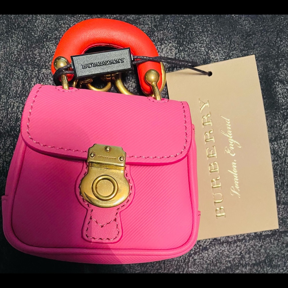 Brand new authentic Burberry coin purse with keychain, all tags are attached